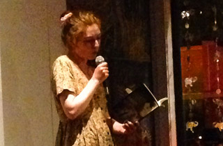 Author and poet Alexandra Naughton (novel, American Mary) reading at a spoken word event. Alexandra is part of a vibrant lit scene based in Oakland.
